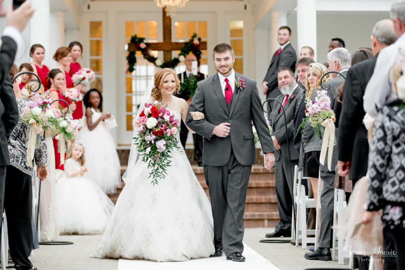 bride and groom walking down the aisle