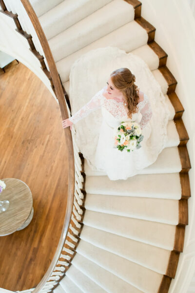 bride walking down staircase