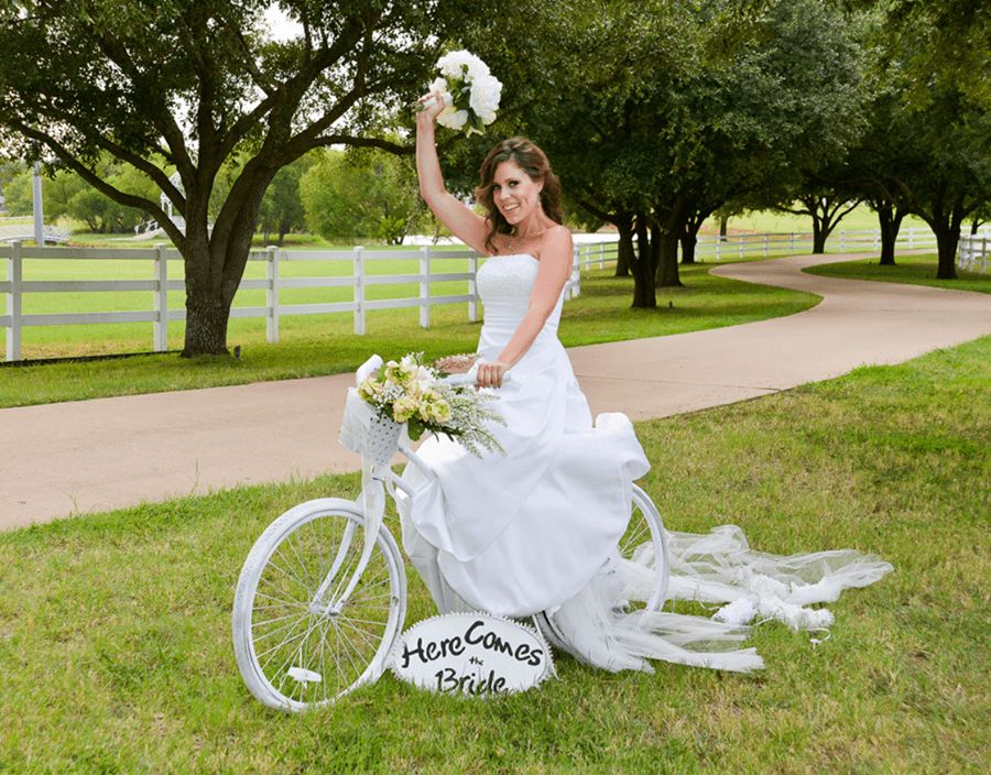 bride on old school white bike