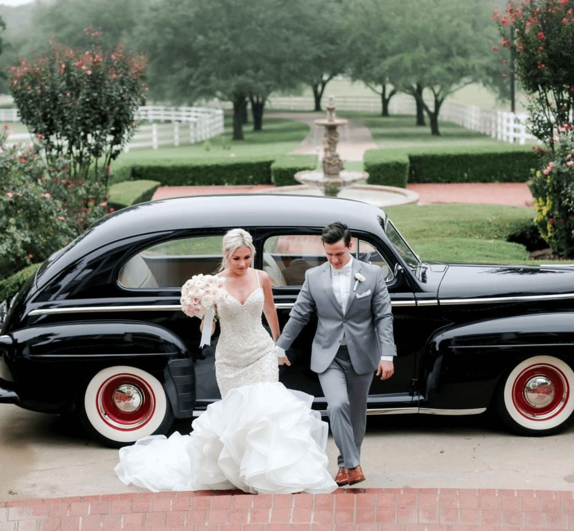 bride and groom and a cool old car
