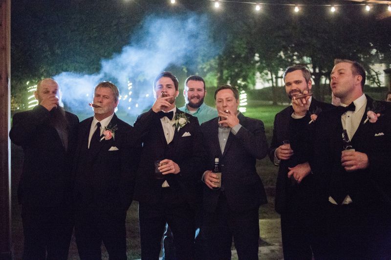 groom party smoking cigars