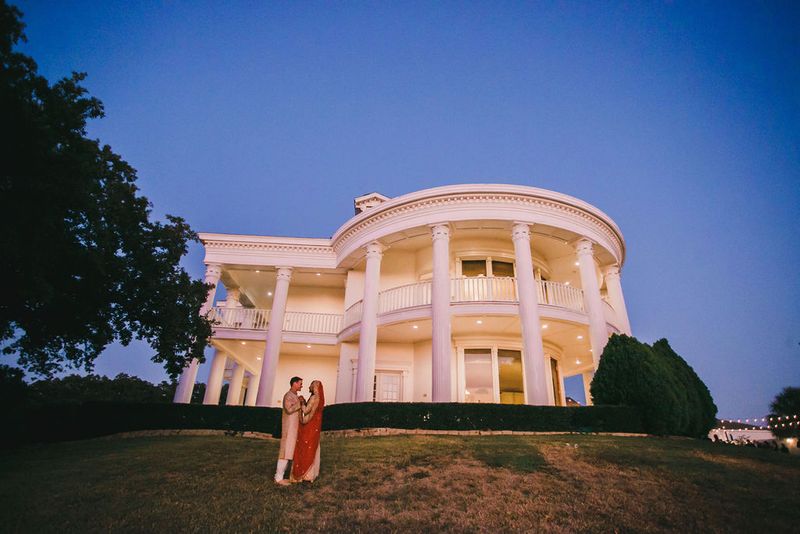 bride and groom photo outside mansion