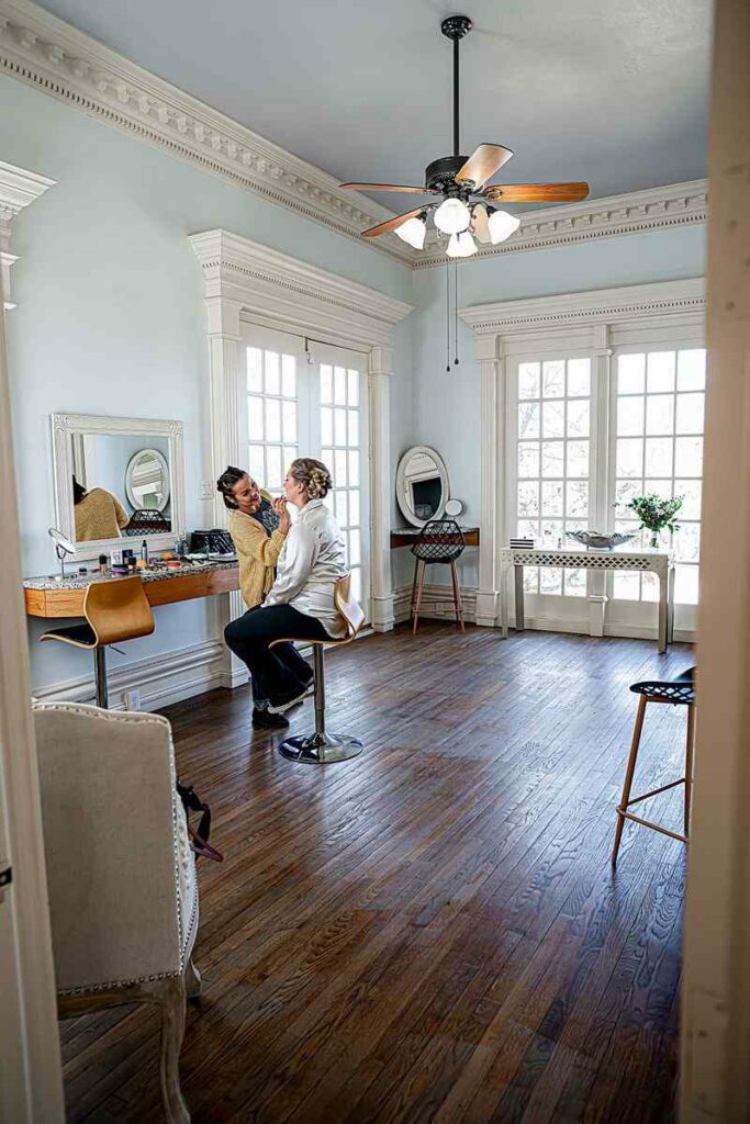 bride getting her makeup done for her wedding