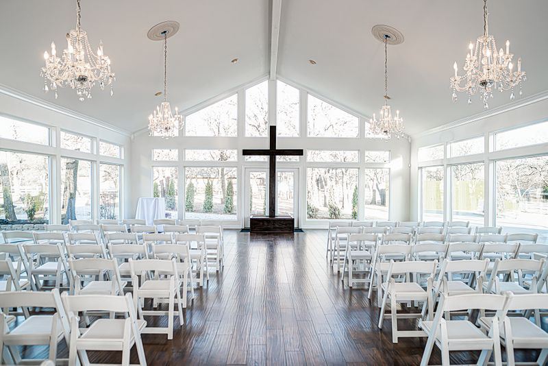 cross at the ceremony of a wedding with seating