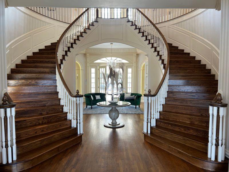 entry way with two staircases